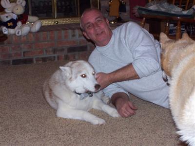 Sandy's husband Phil and their dogs
